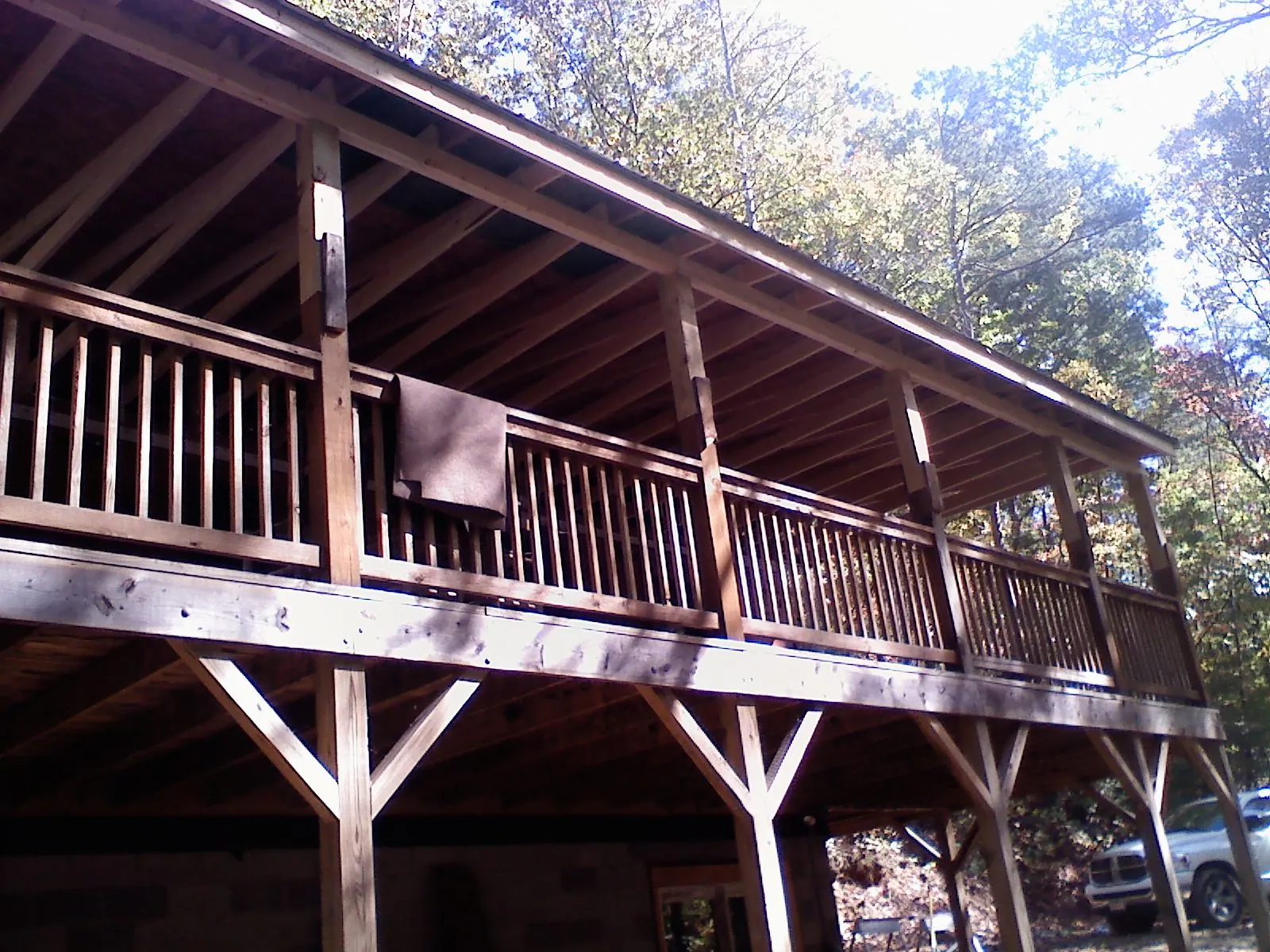 Timber framing under a new elevated porch and deck — Roof Leak Repair in Clint by Roofing Brothers